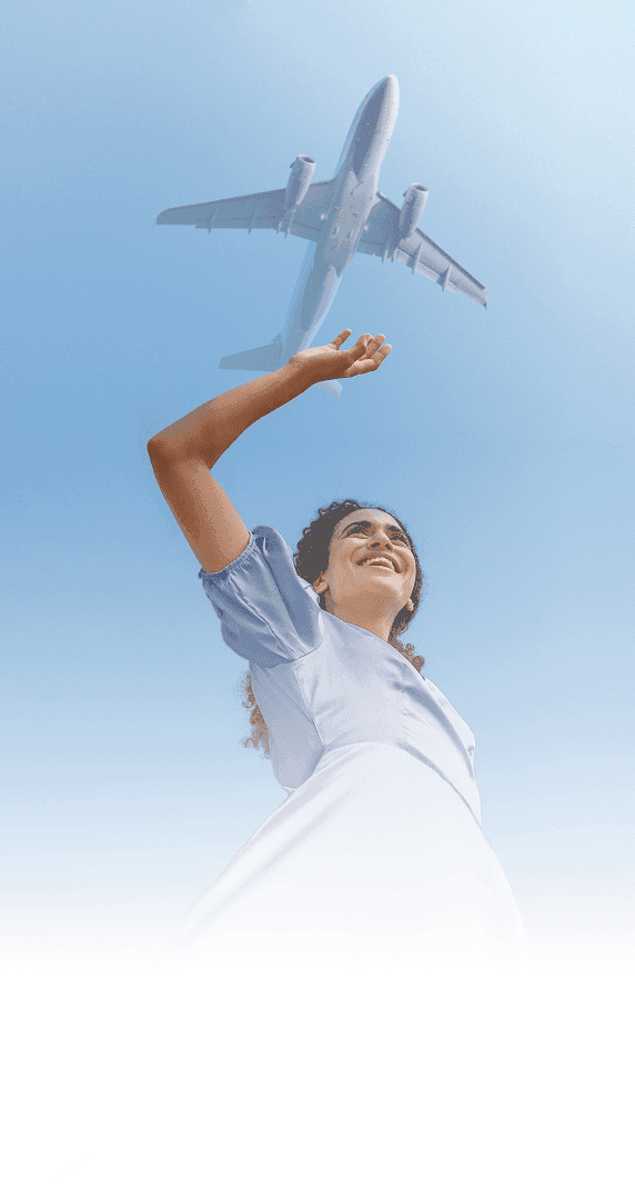 Plane flying over woman